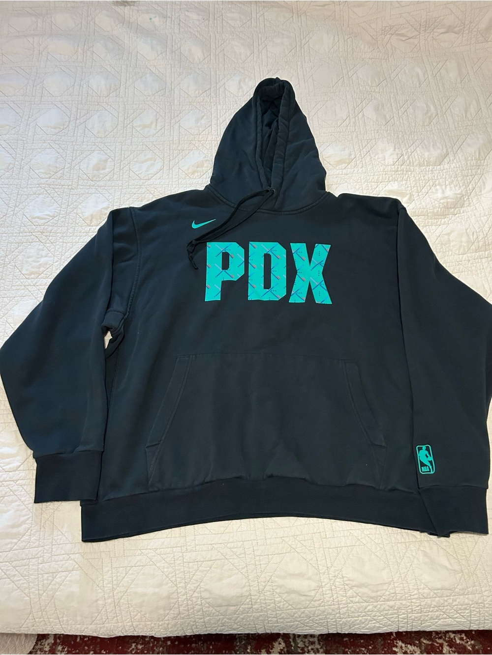 Nike Men's Black Hoodie with Teal PDX Graphic